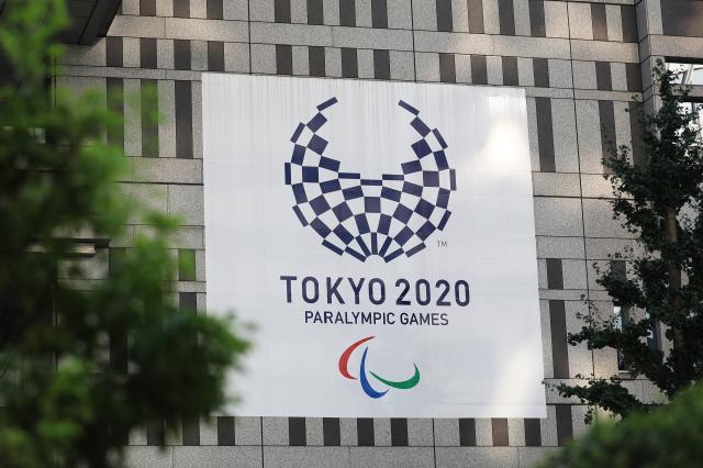 菅义伟与IOC主席举行电话会谈 确认共促奥运成功(1)
