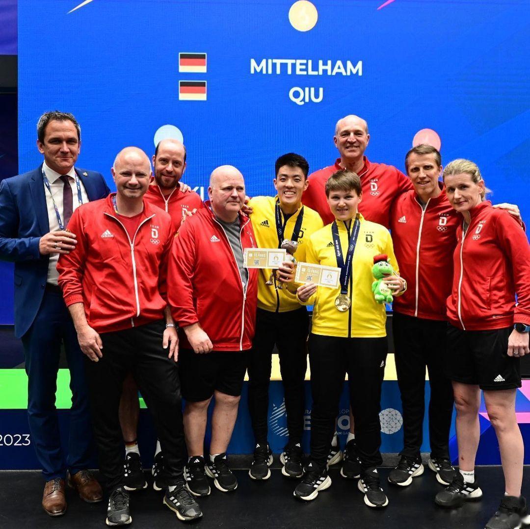  德国组合邱党/米特兰姆获得混双冠军，为德国队拿下一张巴黎奥运会混双入场券。如果(6)